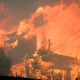 A house burning along Malibu Lake.